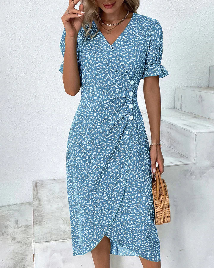 Vestido midi floral con mangas superpuestas y volantes