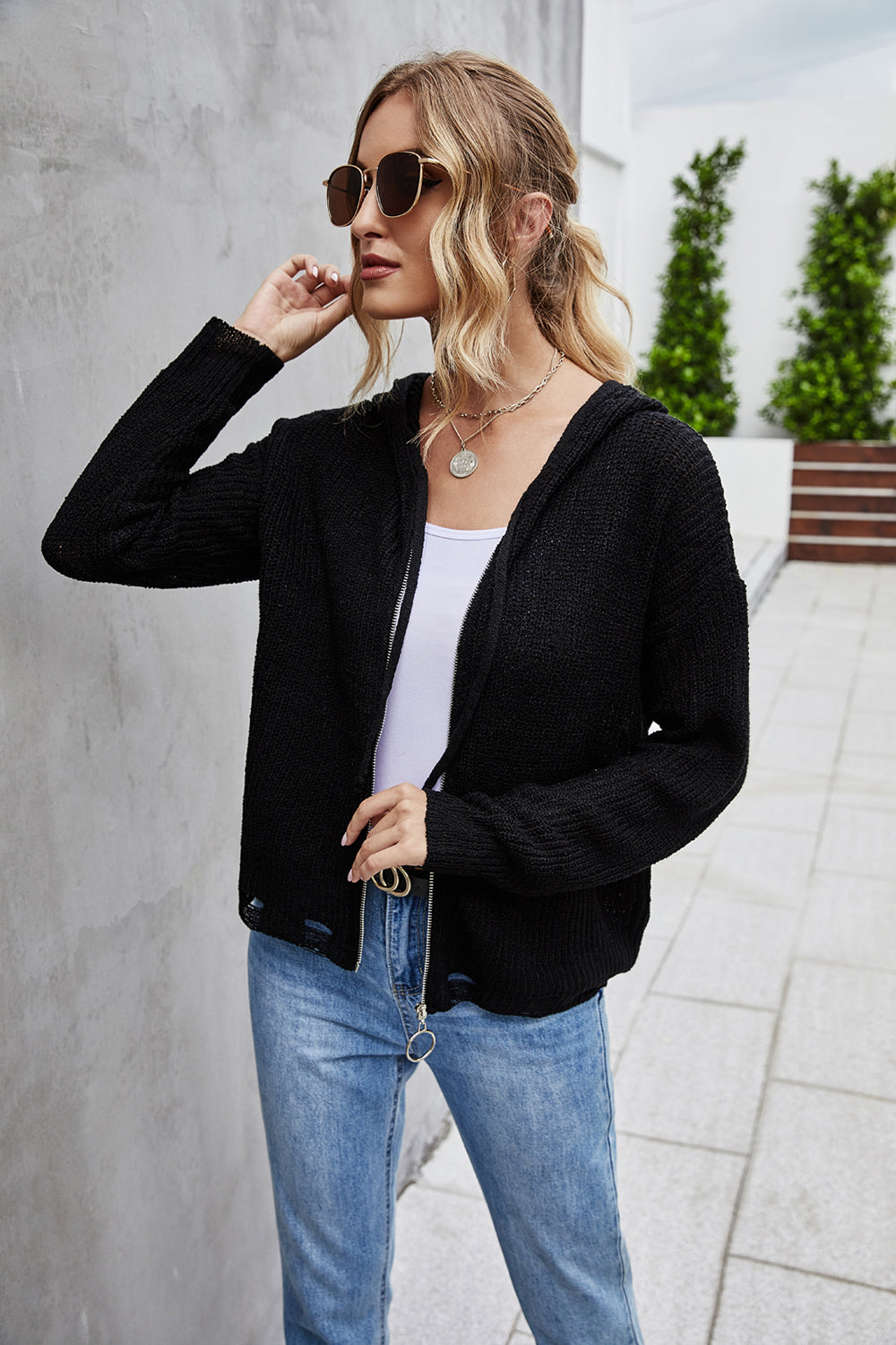 Jersey de punto con capucha y abertura delantera para mujer