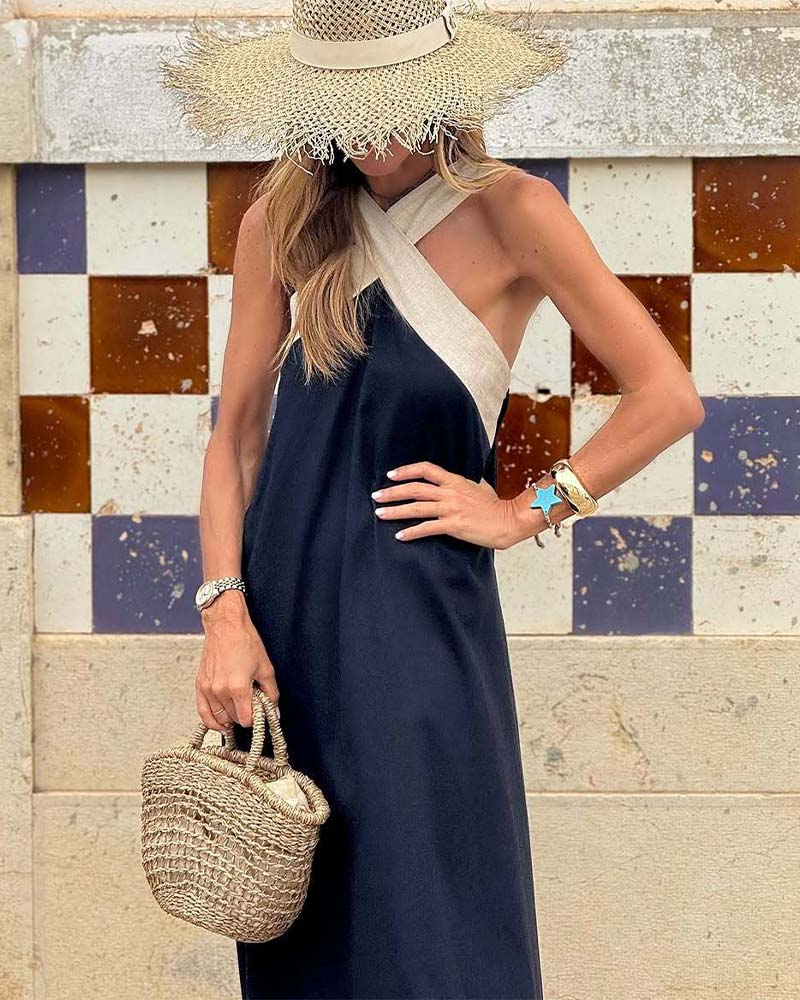 Elegante vestido con escote halterneck y cuello cruzado de moda