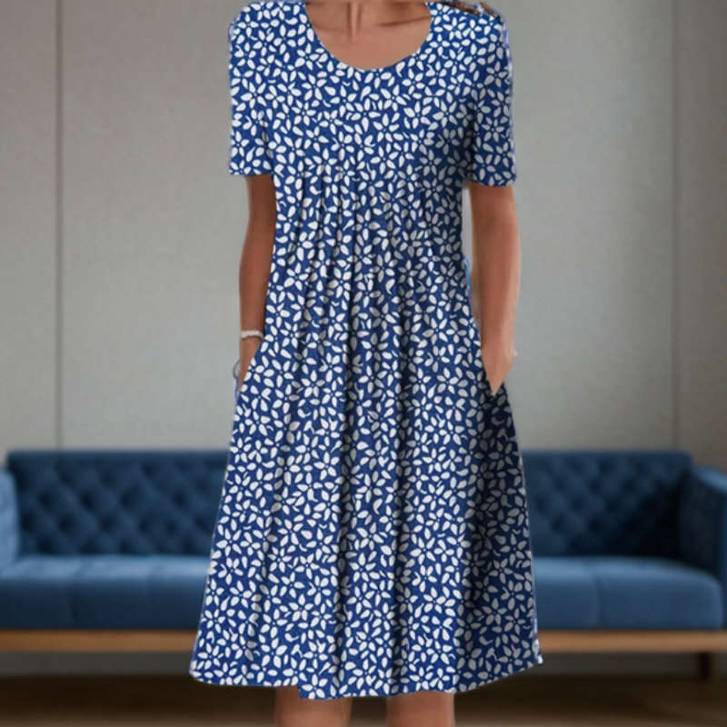 Vestido ancho con cuello redondo, manga tres cuartos y estampado