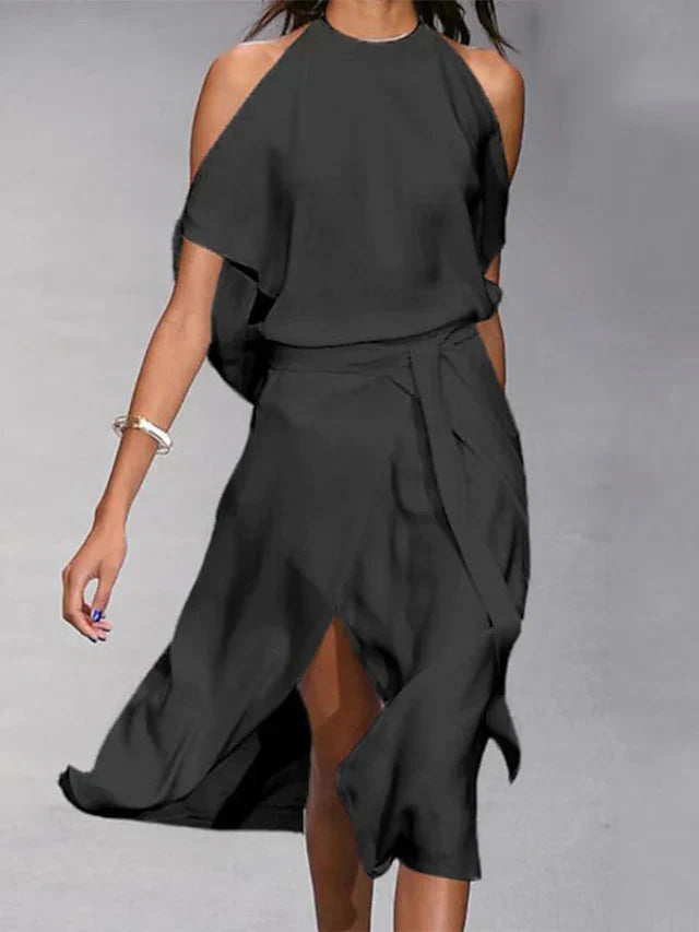 Vestido midi asimétrico con hombros descubiertos y elegante movimiento