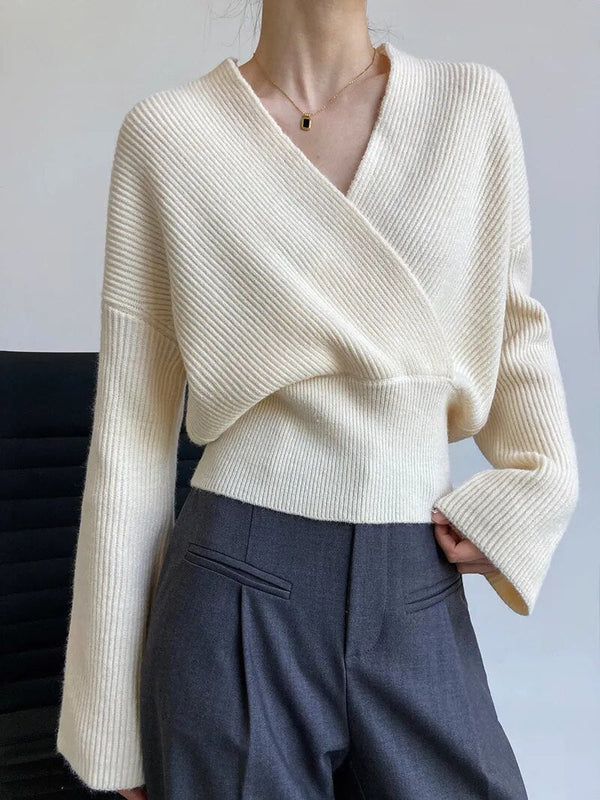 Elegante jersey cruzado con escote profundo