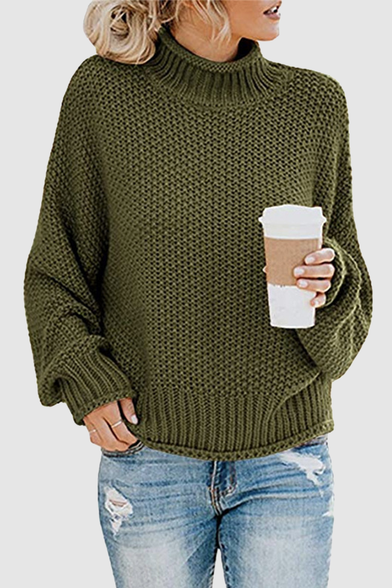 Acogedor jersey con interesante patchwork y cuello alto