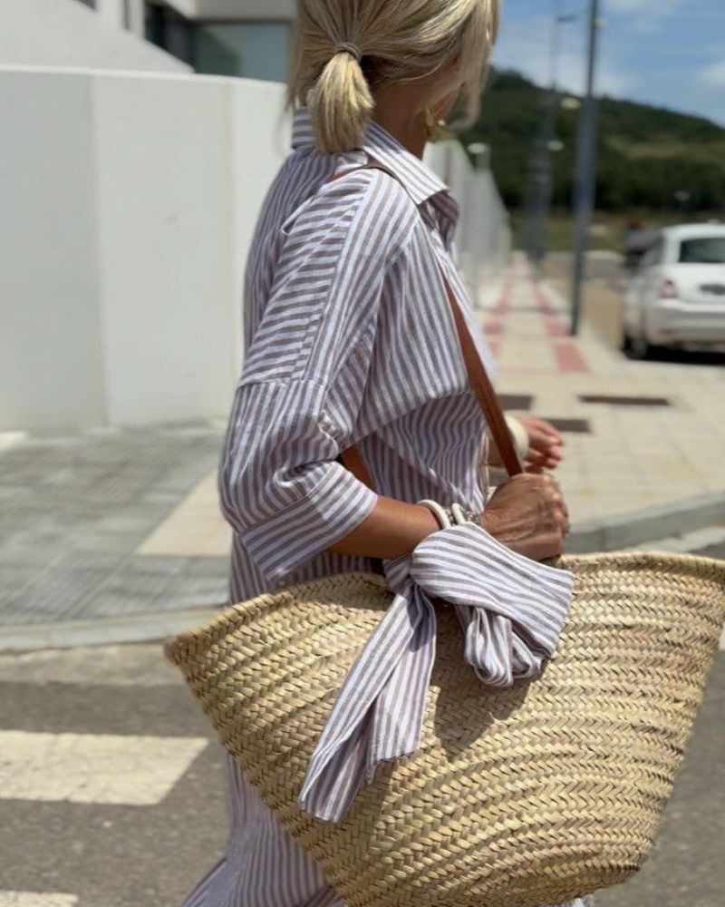 Vestido camisero clásico con elegante lazada