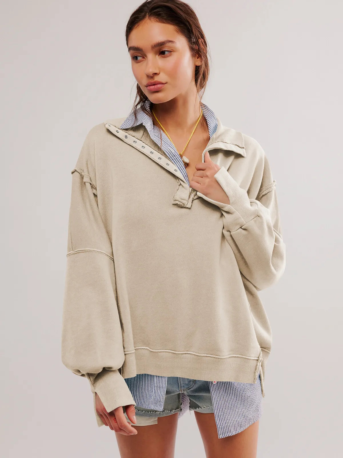 Mela | Sudadera informal con solapa, botones y mangas farolillo