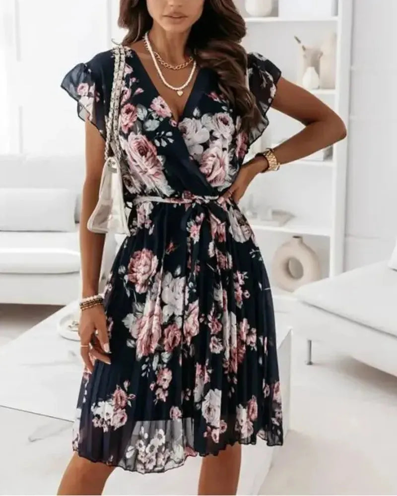 Vestido plisado con estampado floral y cinturón