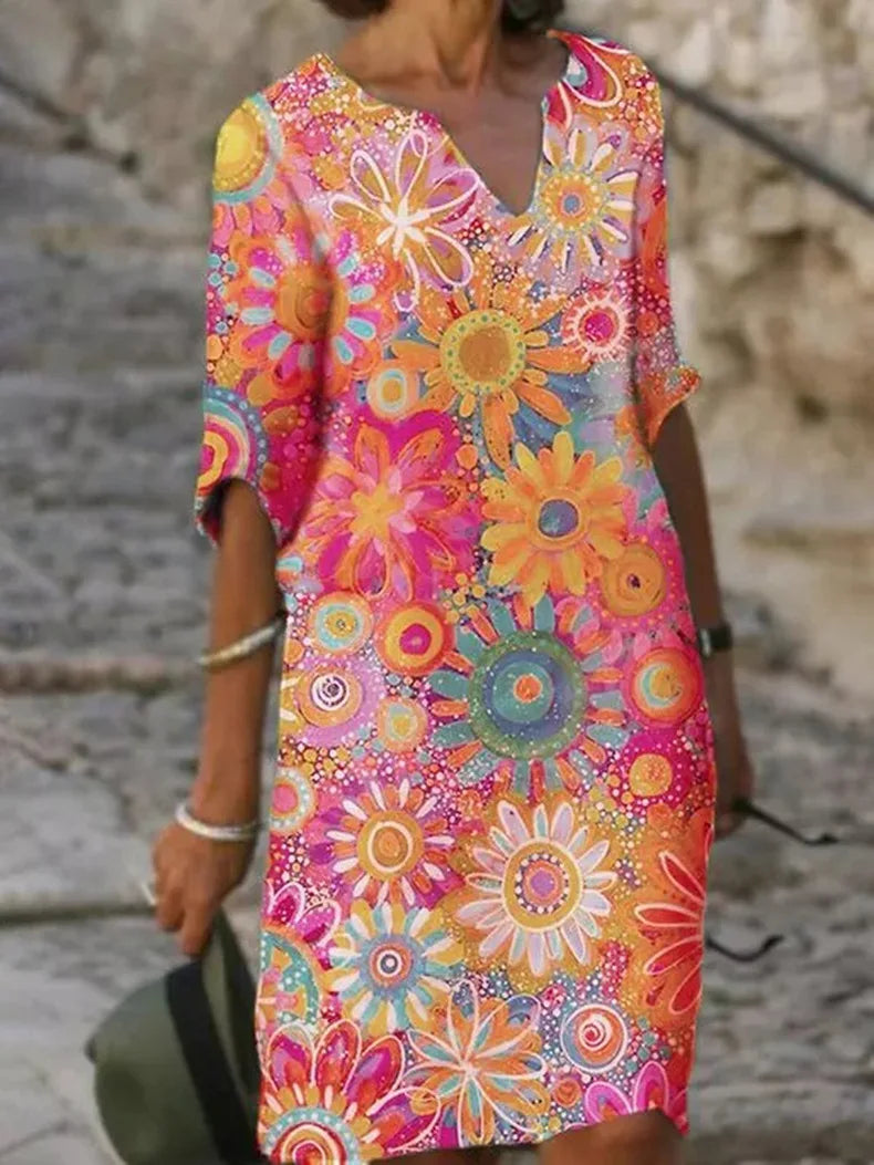 Vestido midi floral con escote en V y elegancia atemporal