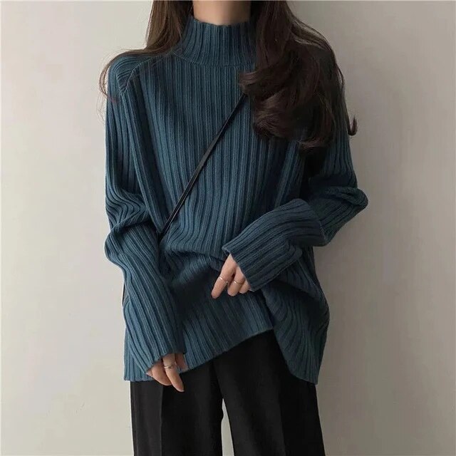 Elegante jersey de cuello alto