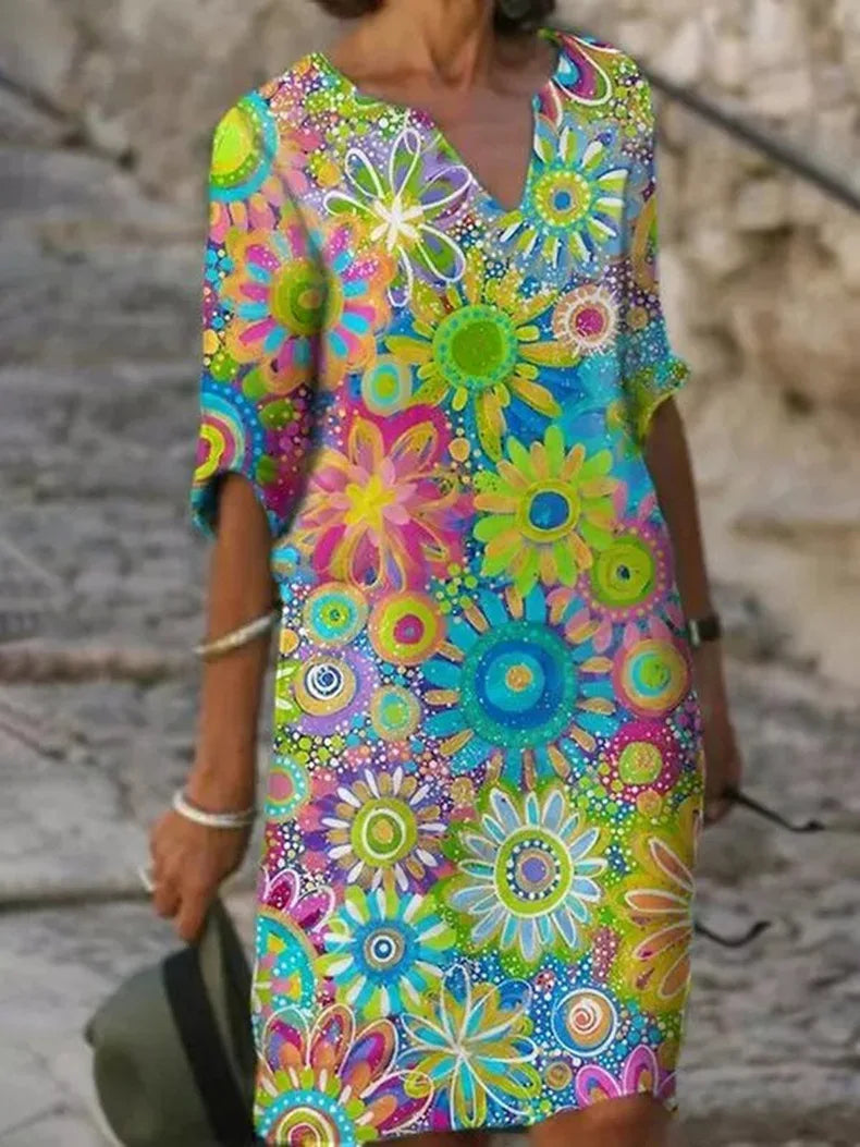 Vestido midi floral con escote en V y elegancia atemporal