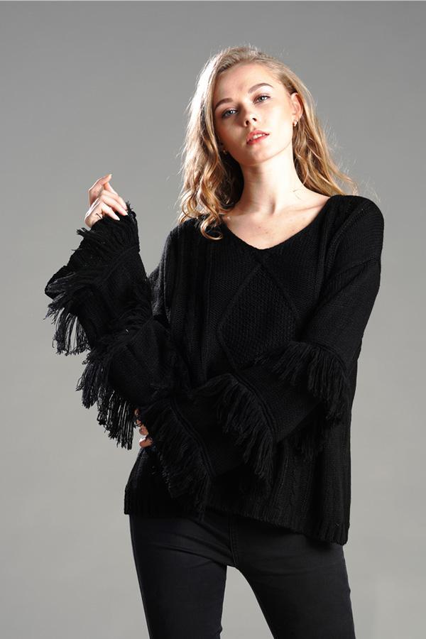 Jersey mullido con borlas para mujer