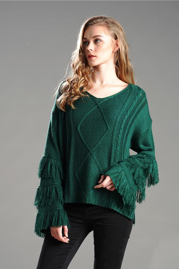 Jersey mullido con borlas para mujer