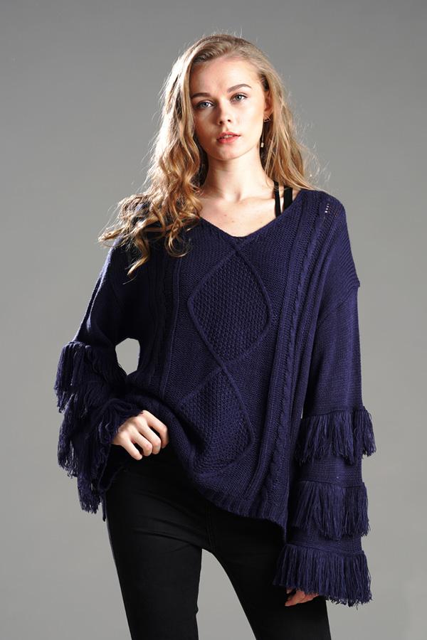 Jersey mullido con borlas para mujer
