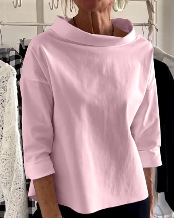Elegante top con cuello alto para mujer