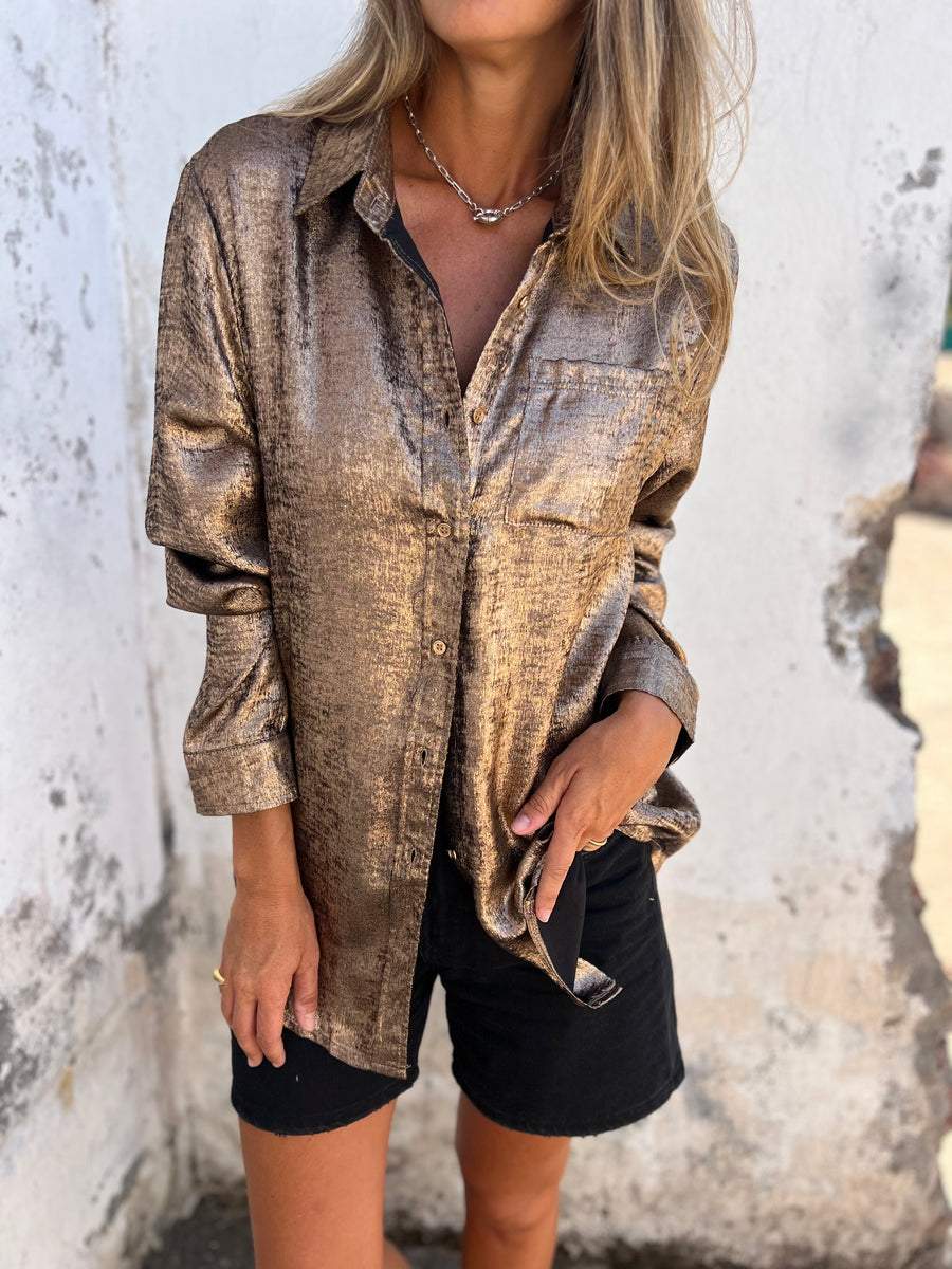 Blusa metálica de mujer con cuello