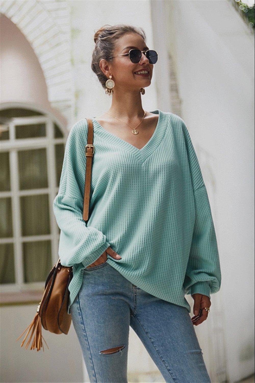 Jersey holgado de manga larga y cuello de pico para mujer