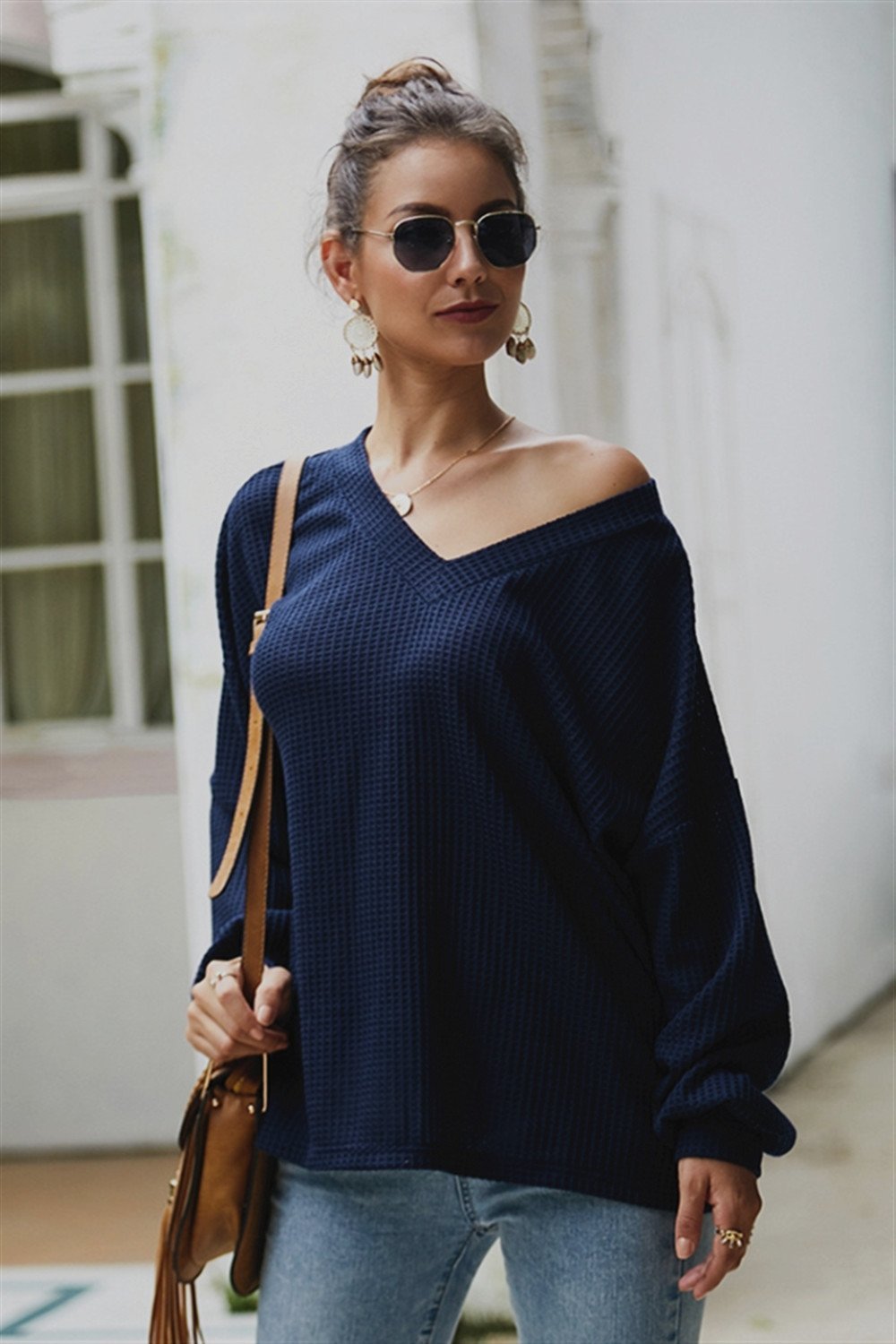 Jersey holgado de manga larga y cuello de pico para mujer