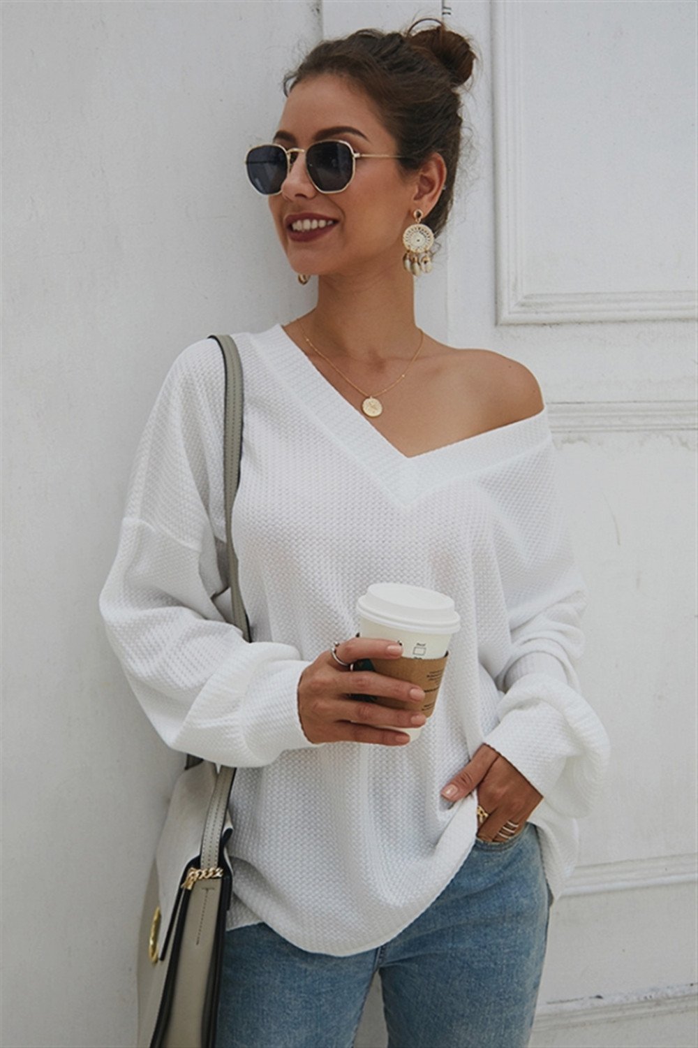 Jersey holgado de manga larga y cuello de pico para mujer