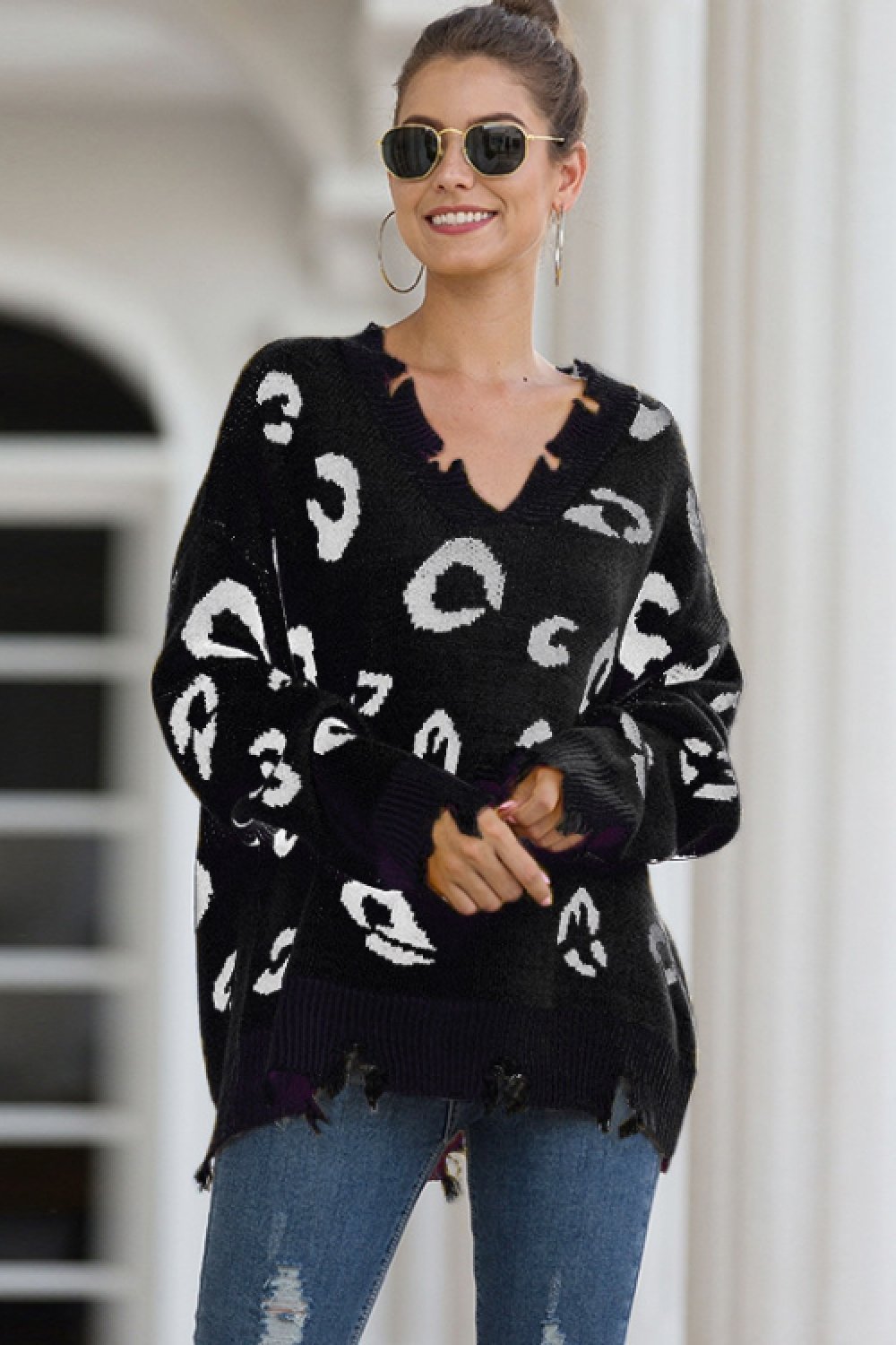 Jersey de leopardo con cuello de pico para mujer