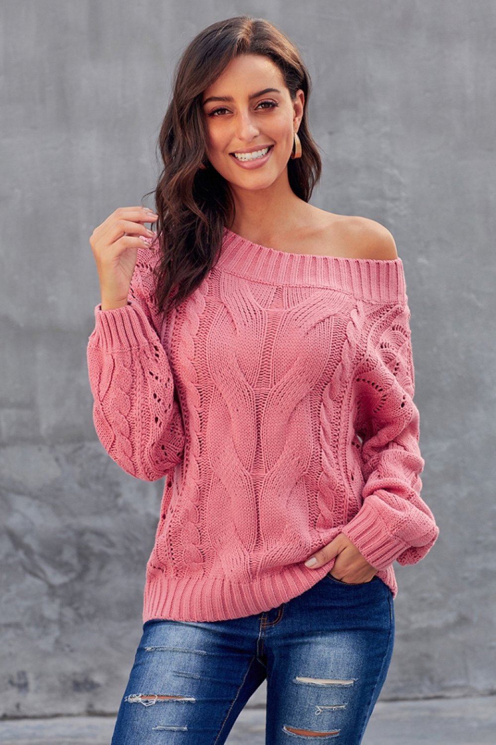 Jersey con cable suelto y color sólido para mujer