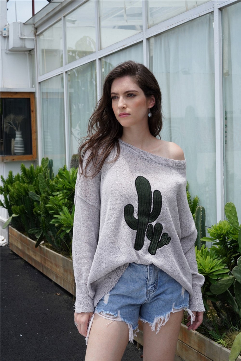 Jersey con hombros caídos y cuello redondo para mujer