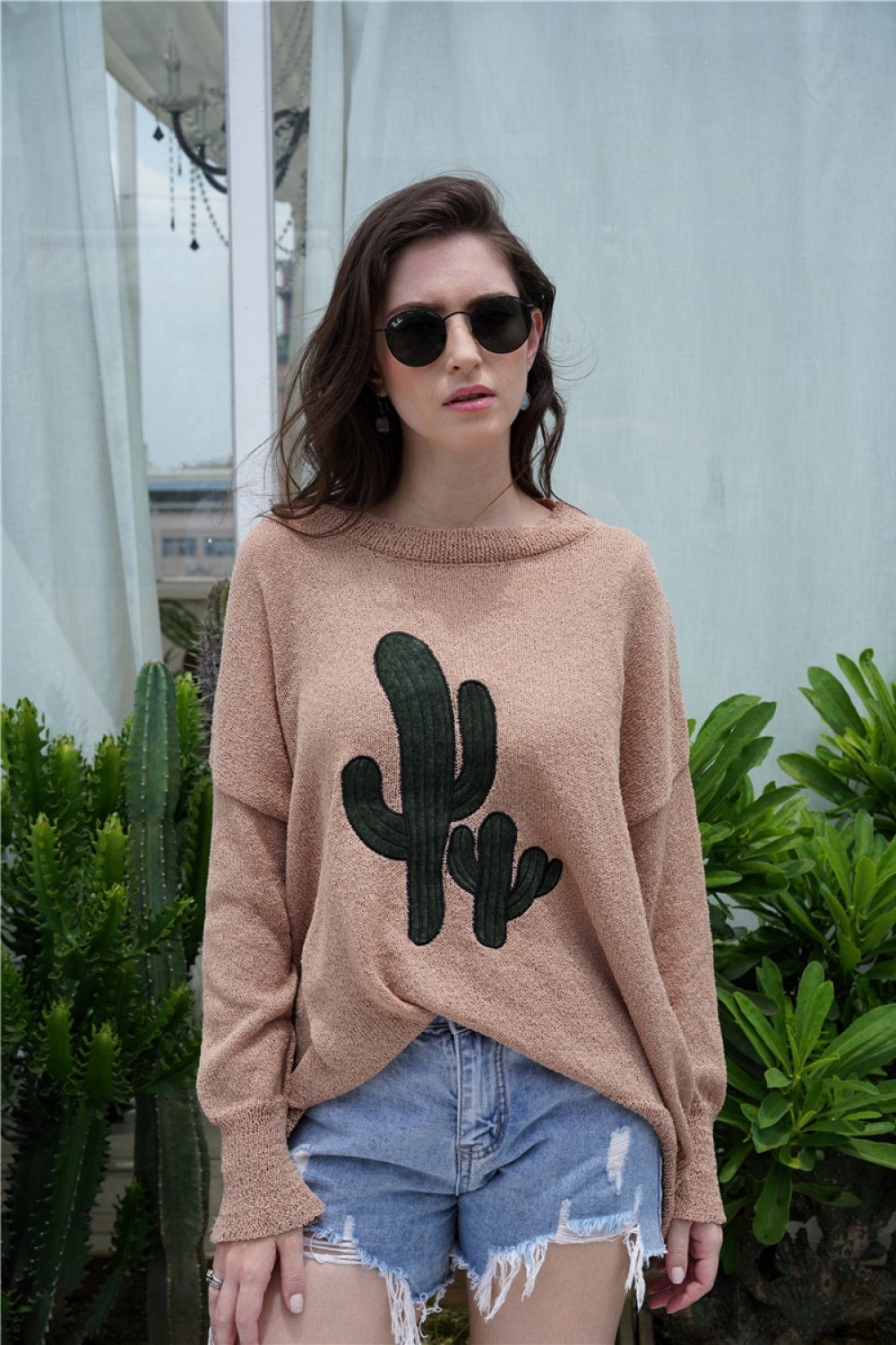 Jersey con hombros caídos y cuello redondo para mujer