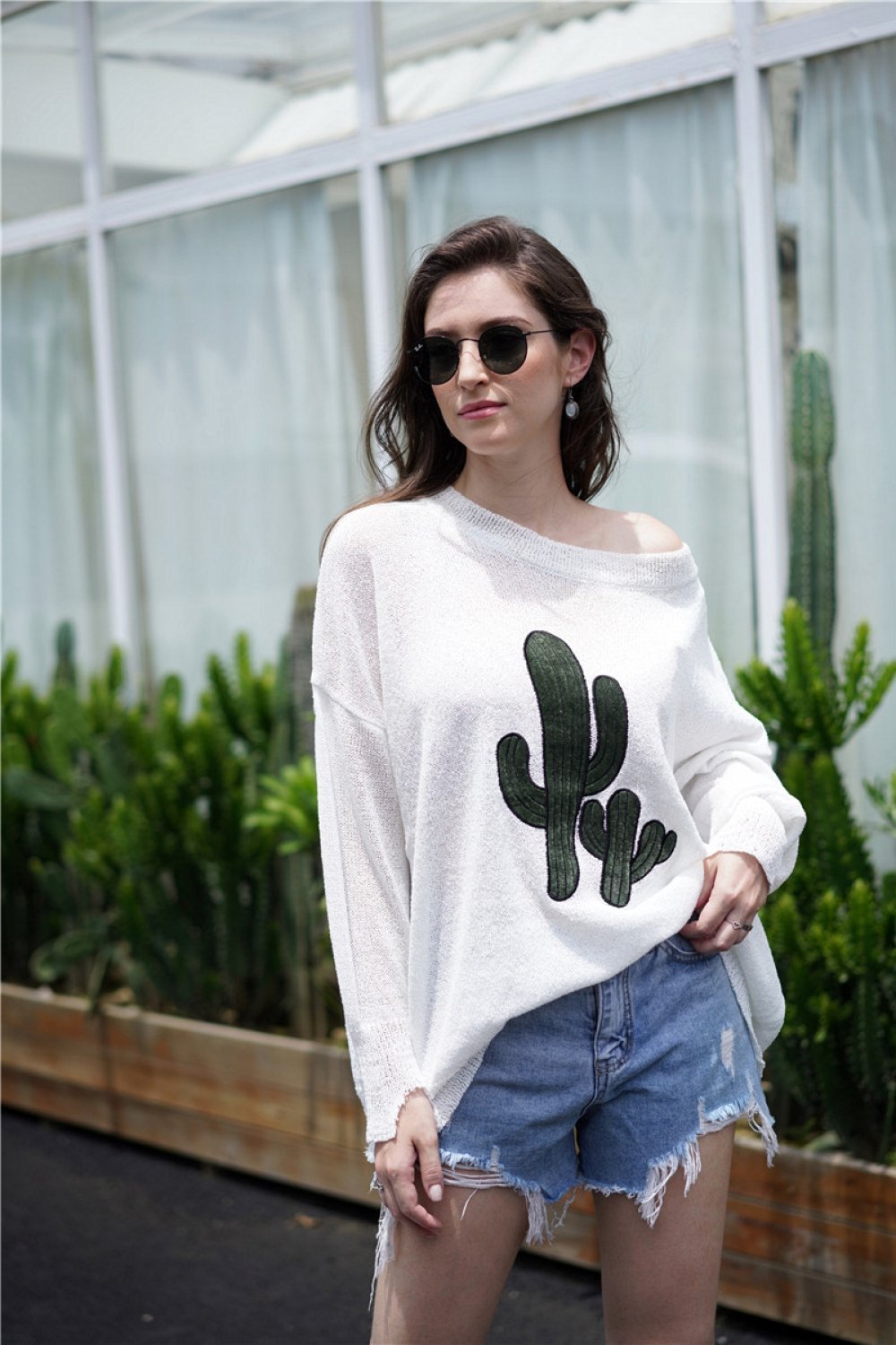 Jersey con hombros caídos y cuello redondo para mujer