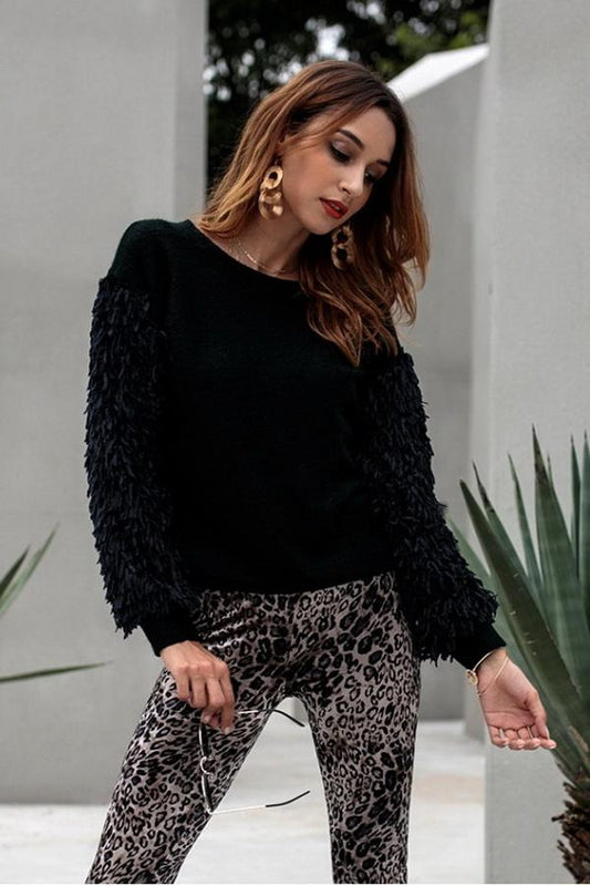 Jersey de mujer con mangas de borlas y escote redondo