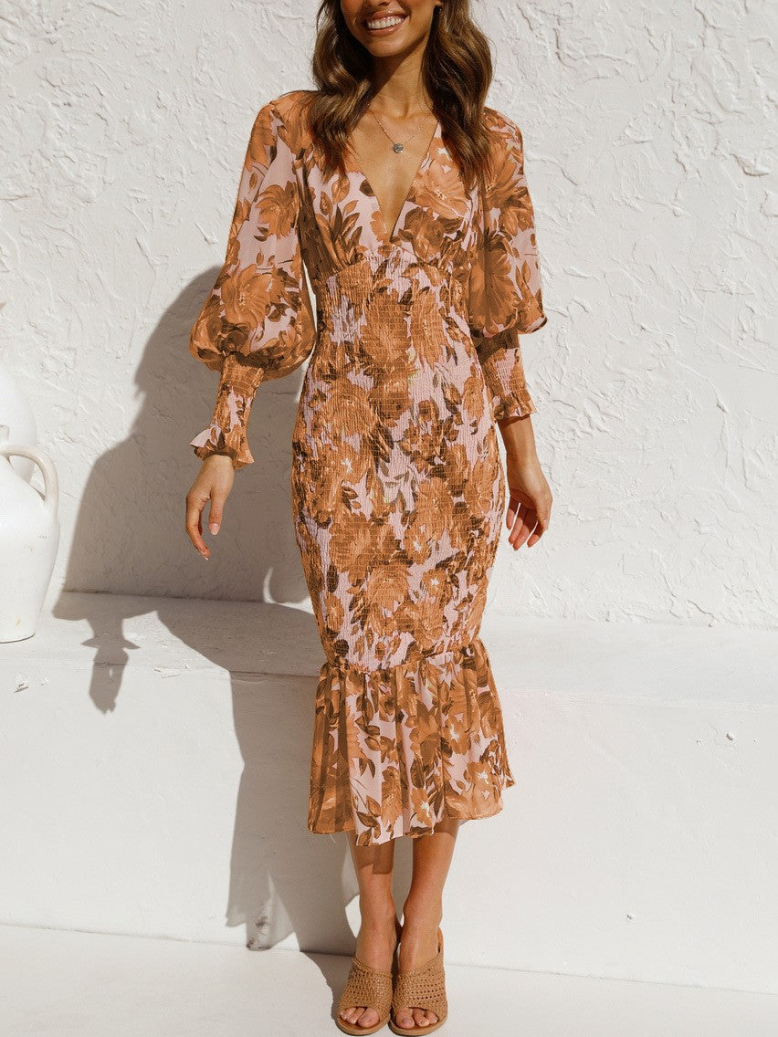 Vestido de manga larga con cintura elástica y falda de volantes estampada