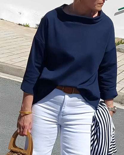 Elegante top con cuello alto para mujer