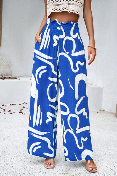 Pantalón ancho estampado con bata y bolsillos