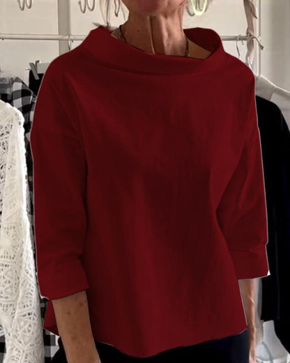 Elegante top con cuello alto para mujer