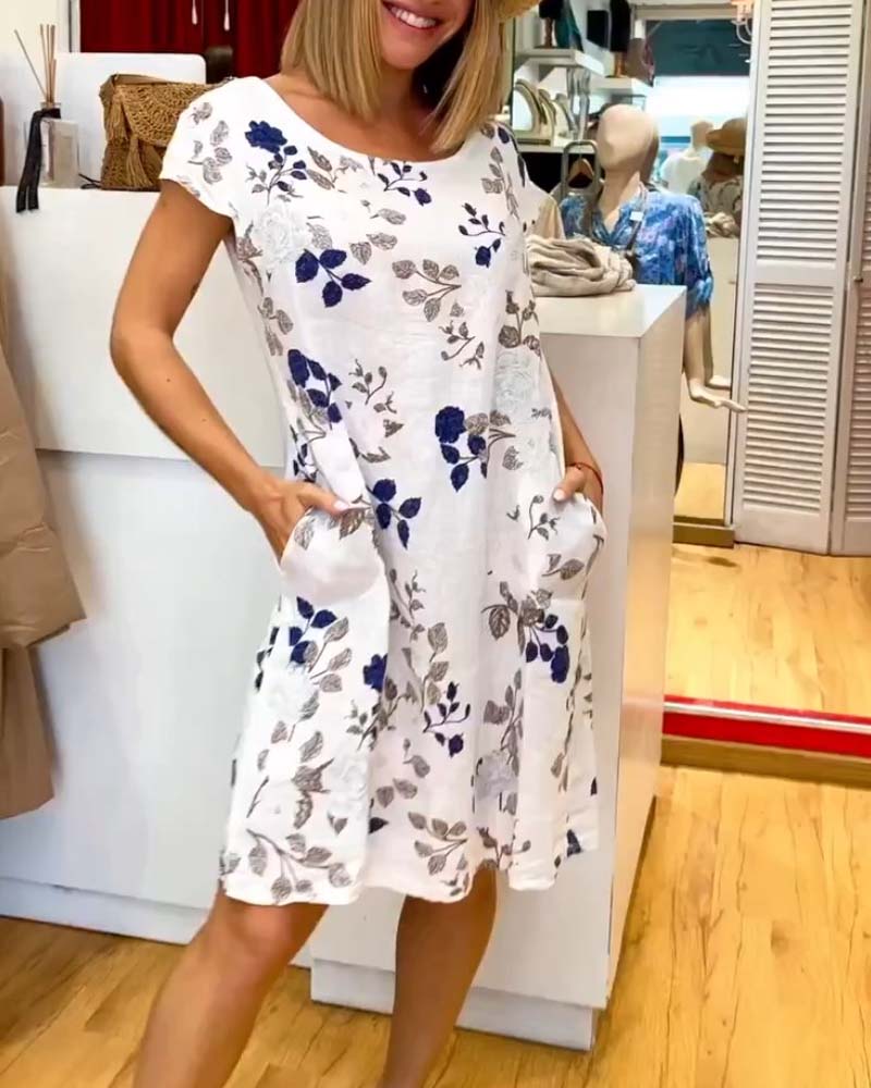 Vestido con bolsillos y estampado floral