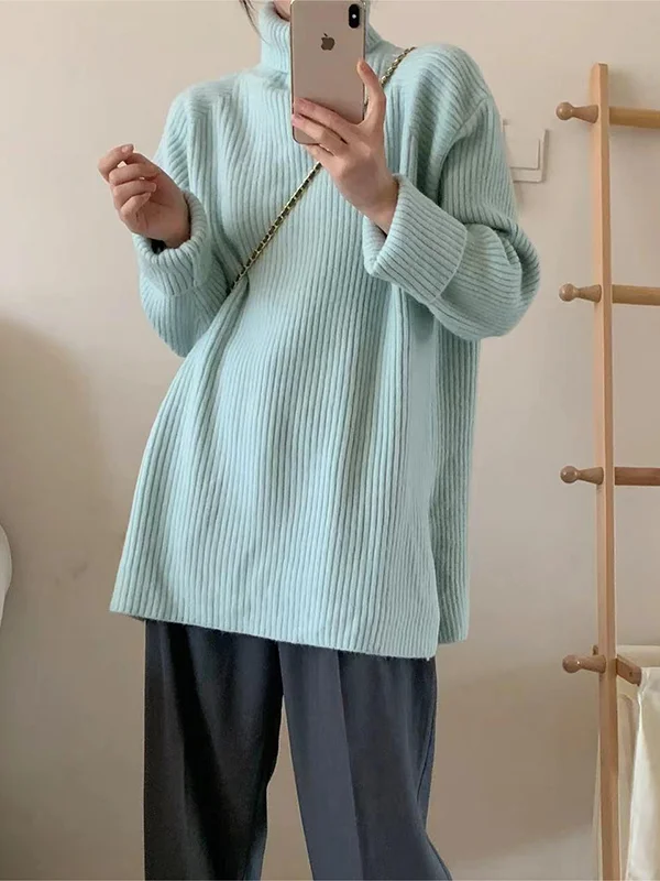 Elegante jersey de manga larga y aberturas laterales