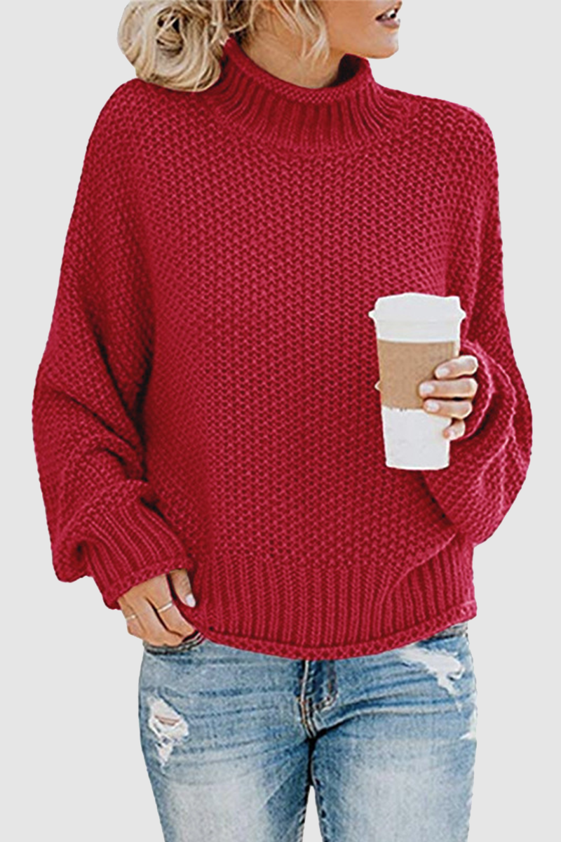 Acogedor jersey con interesante patchwork y cuello alto