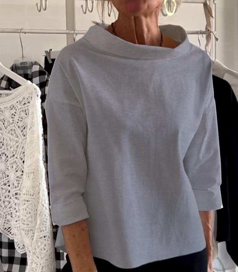 Elegante top con cuello alto para mujer