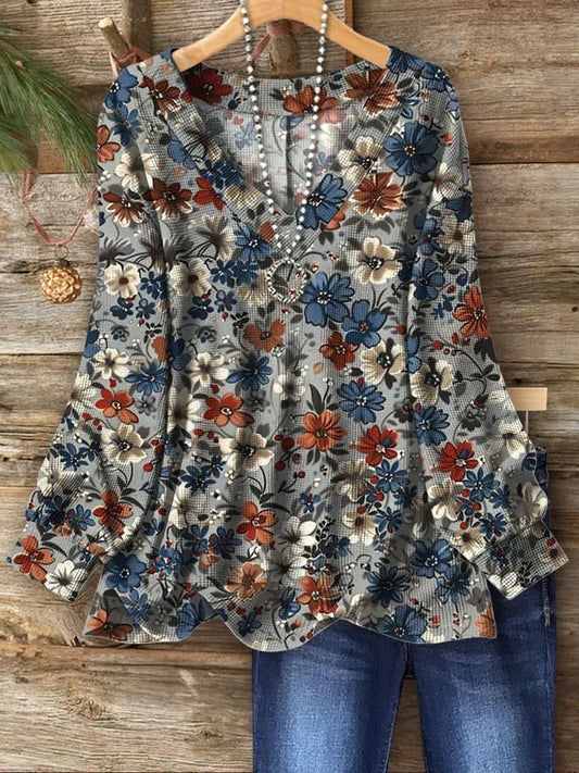 Elegante blusa de manga larga con sofisticado escote en V