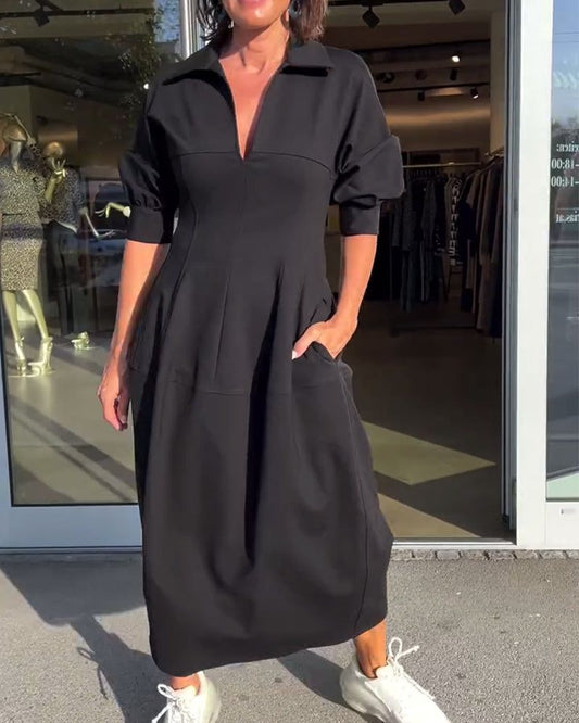Vestido midi minimalista con un estilo estructurado y moderno