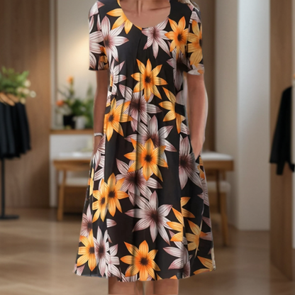 Vestido ancho con cuello redondo, manga tres cuartos y estampado