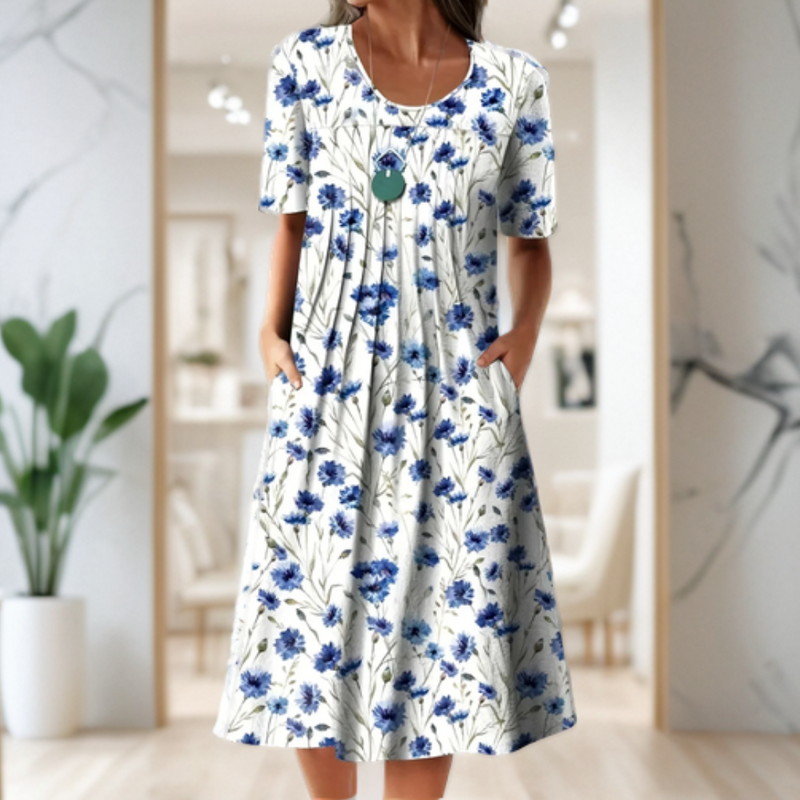 Vestido ancho con cuello redondo, manga tres cuartos y estampado