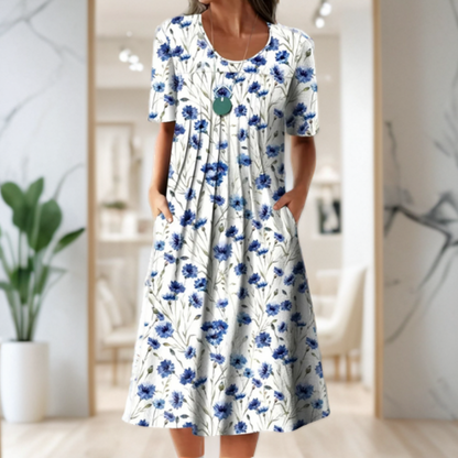Vestido ancho con cuello redondo, manga tres cuartos y estampado