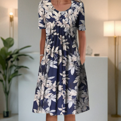 Vestido ancho con cuello redondo, manga tres cuartos y estampado