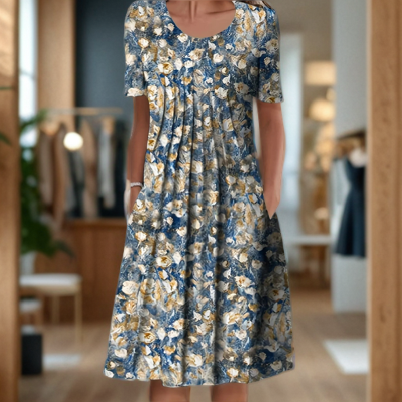 Vestido ancho con cuello redondo, manga tres cuartos y estampado