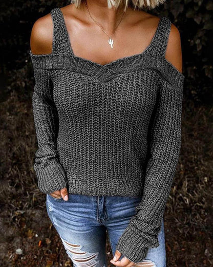 Elegante jersey con aberturas en los hombros y punto grueso