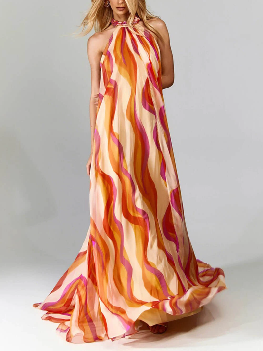 Elegante vestido largo de verano con cuello halter y estampado de volantes