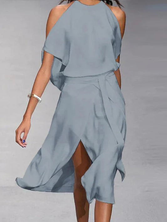 Vestido midi asimétrico con hombros descubiertos y elegante movimiento