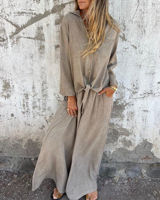 Elegante conjunto de verano para mujer con pantalones anchos y blusa abotonada de manga larga