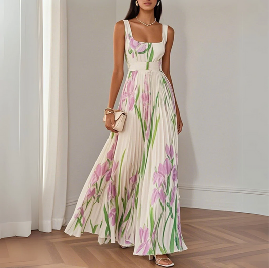 Elegante vestido largo con tirantes, falda plisada y delicado estampado floral