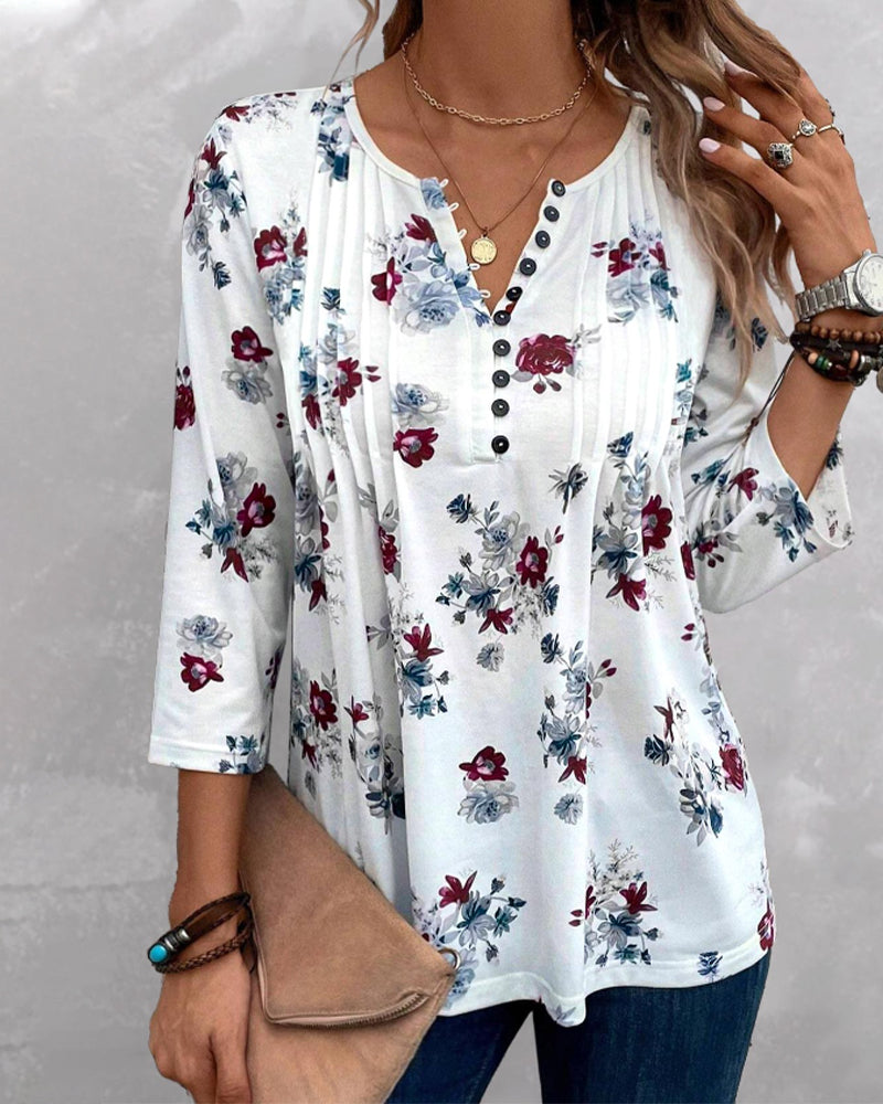 Elegante blusa con botones de presión florales