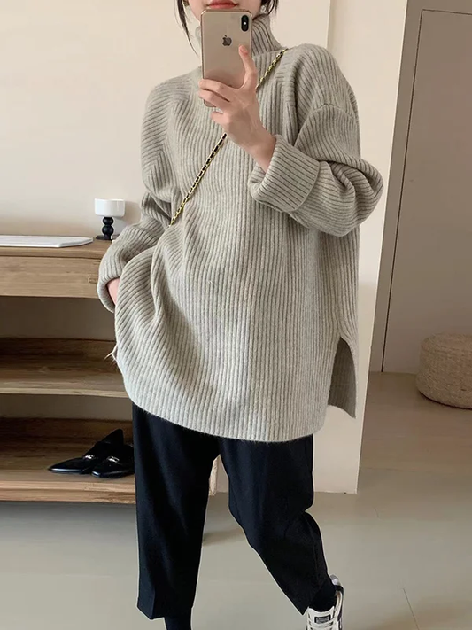 Elegante jersey de manga larga y aberturas laterales
