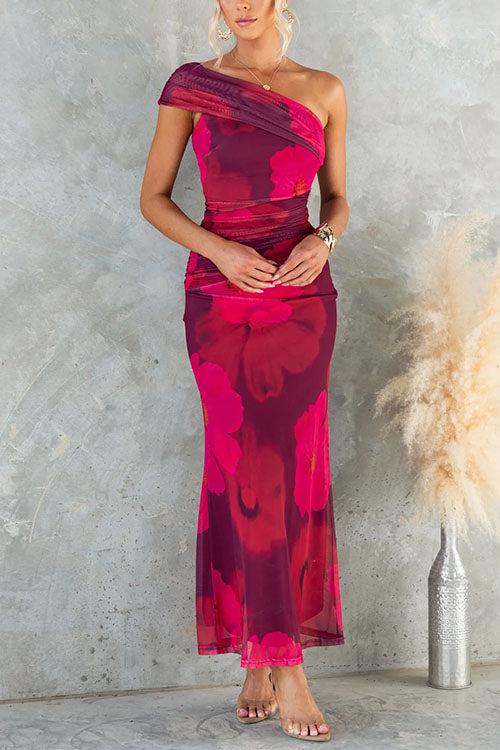 Vestido largo asimétrico con elegante estampado floral
